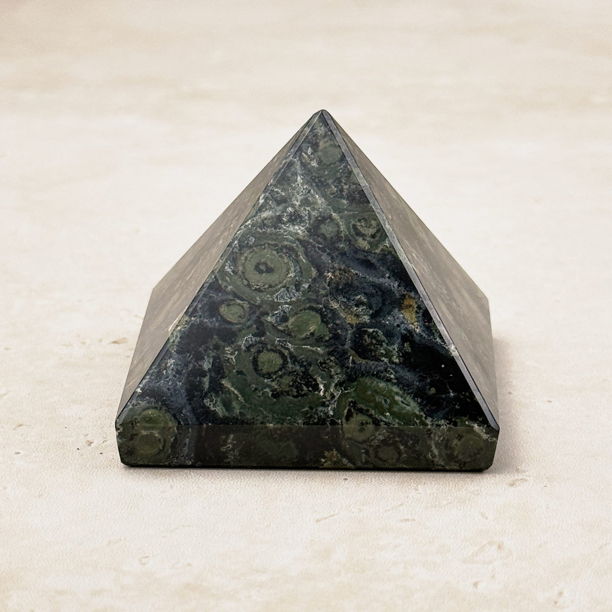 Kambaba jasper crystal pyramid 5cm, dark green with black circular patterns, front view — Eternal Spirit