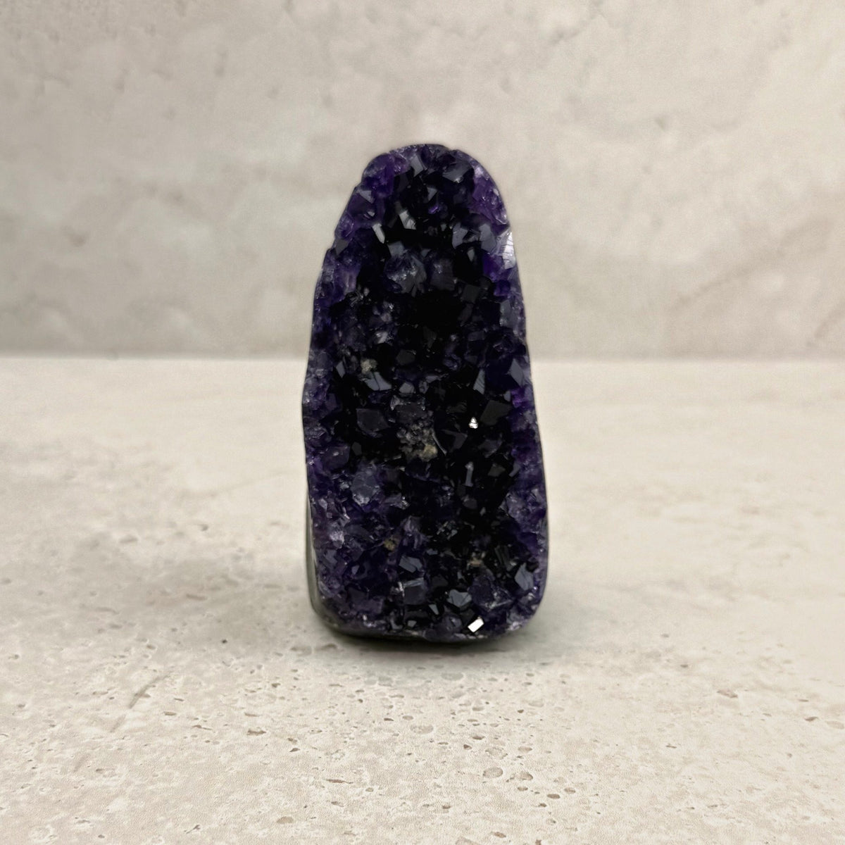 Base cut amethyst crystal 9.5cm, slim column of deep purple crystals, front view — Eternal Spirit