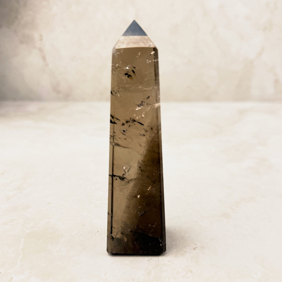 Smoky quartz crystal obelisk 11.5cm, clear brown with dark inclusions, standing upright — Eternal Spirit