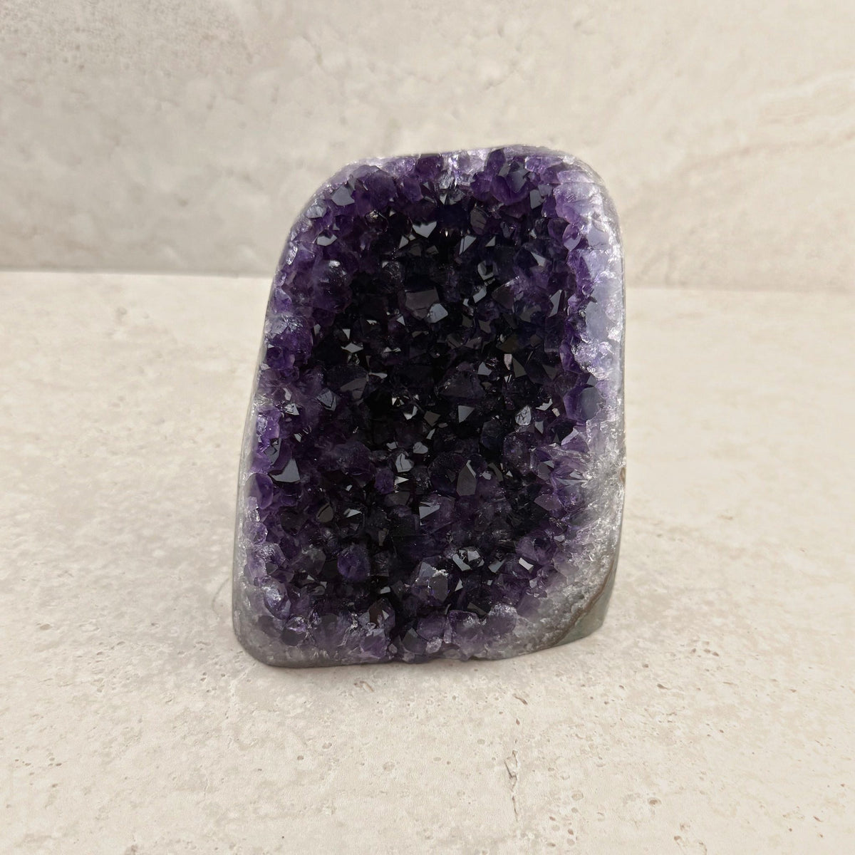 Base cut amethyst crystal 13.5cm, squarish face with a lavender rim, front view — Eternal Spirit