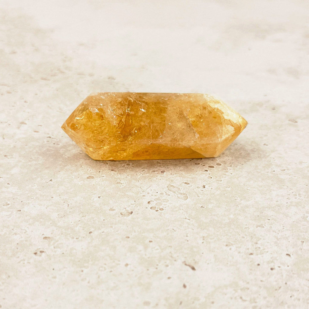 Stout heated citrine crystal wand 7cm, honey gold all through, low side view — Eternal Spirit