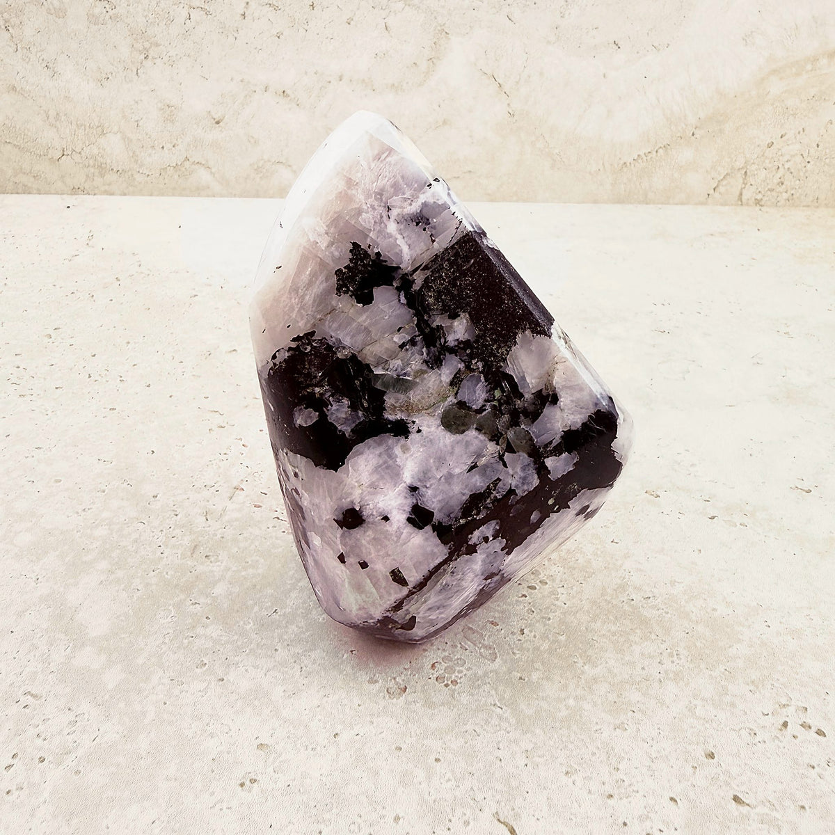 Tall rainbow moonstone crystal freeform 11cm, standing upright, side view — Eternal Spirit