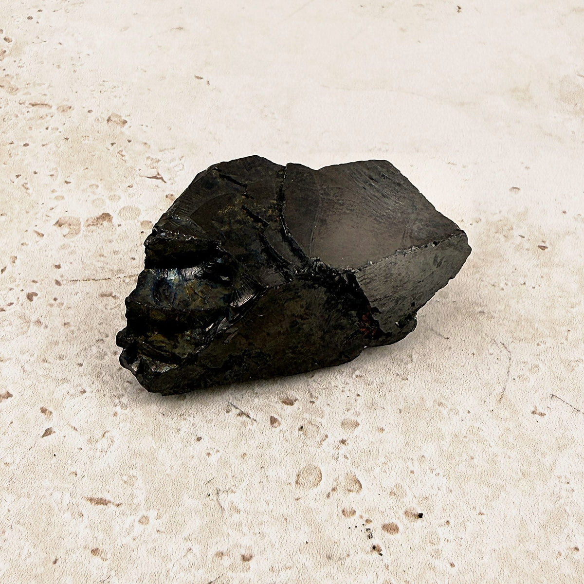 Wedge elite shungite rough crystal 5cm, small black wedge shape, front view — Eternal Spirit