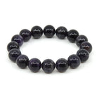 polished Amethyst 12mm round bead bracelet on white background — Eternal Spirit