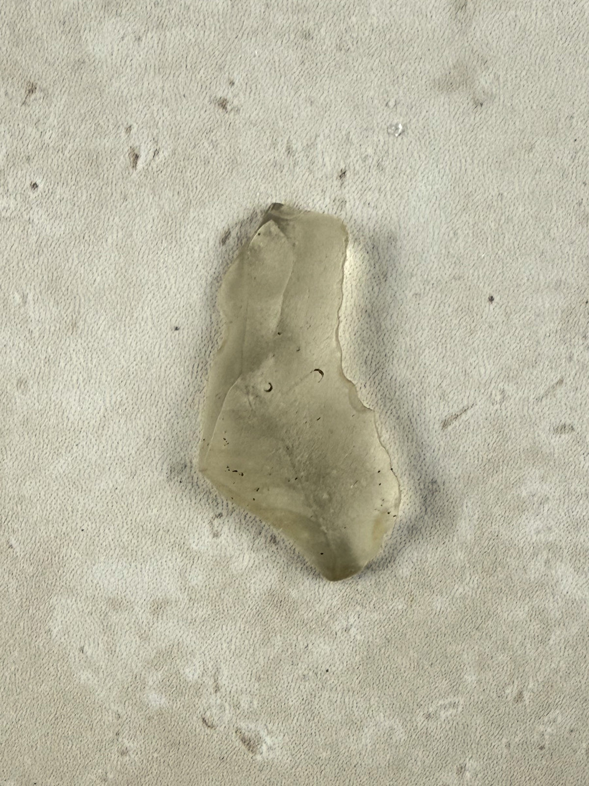 Natural Libyan Desert Glass, a long pale golden piece of impact glass from the Sahara on a stone tile, one of a kind — Eternal Spirit