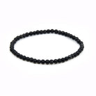 polished Shungite 4mm round bead bracelet on white background — Eternal Spirit