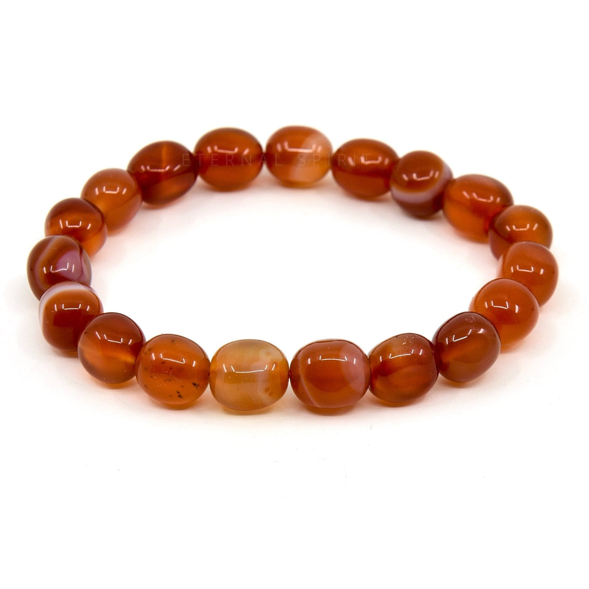 polished Carnelian tumbled round bead bracelet on white background — Eternal Spirit