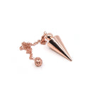 Close-up of warm polished copper metal cone pendulum, metal finish detail — Eternal Spirit