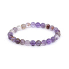 polished Auralite 23 8mm round bead bracelet on white background — Eternal Spirit