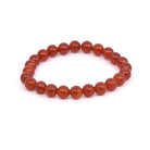 polished Carnelian 8mm round bead bracelet on white background — Eternal Spirit