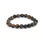 polished Chiastolite tumbled round bead bracelet on white background — Eternal Spirit