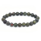 polished Jasper (Dragon's Blood) 8mm round bead bracelet on white background — Eternal Spirit
