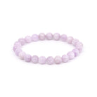 polished Kunzite 8mm round bead bracelet on white background — Eternal Spirit