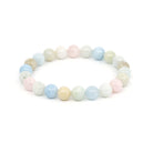 polished Morganite 8mm round bead bracelet on white background — Eternal Spirit