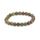 polished Unakite 8mm round bead bracelet on white background — Eternal Spirit