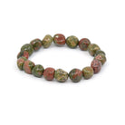 polished Unakite tumbled round bead bracelet on white background — Eternal Spirit