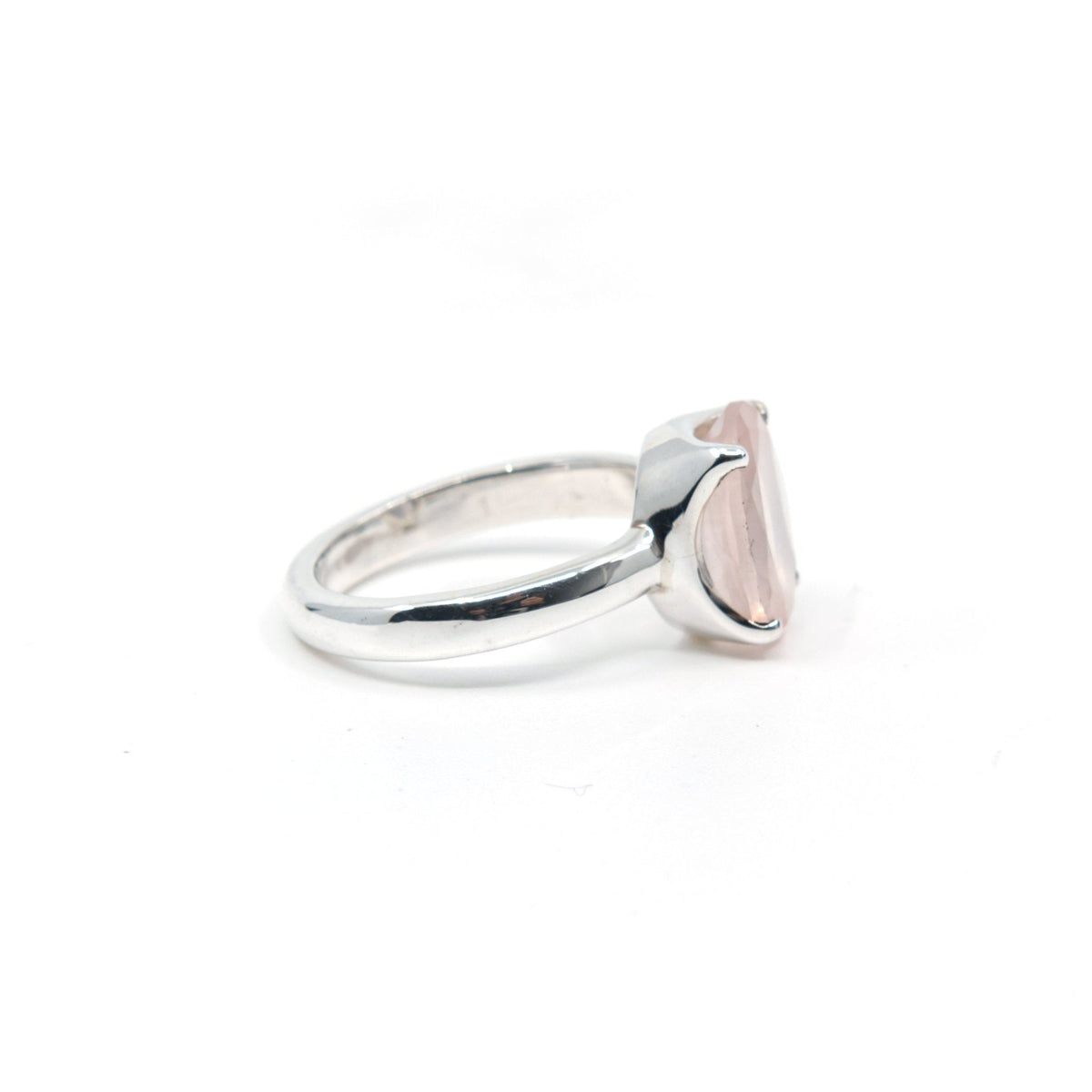 Quartz (Rose) ring #R250 angled to reveal its polished setting and silver band — Eternal Spirit