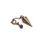 Close-up of dark antique copper metal cone pendulum, metal finish detail — Eternal Spirit