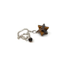 Close-up of Tiger Eye (Yellow) merkaba star pendulum, golden-banded stone detail — Eternal Spirit
