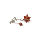 Close-up of Jasper (Red) merkaba star pendulum, earthy red stone detail — Eternal Spirit