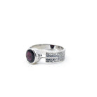elegant side profile of Garnet ring #R498, the gemstone catching light — Eternal Spirit