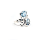 Topaz (Blue) ring #R505 angled to reveal its polished setting and silver band — Eternal Spirit