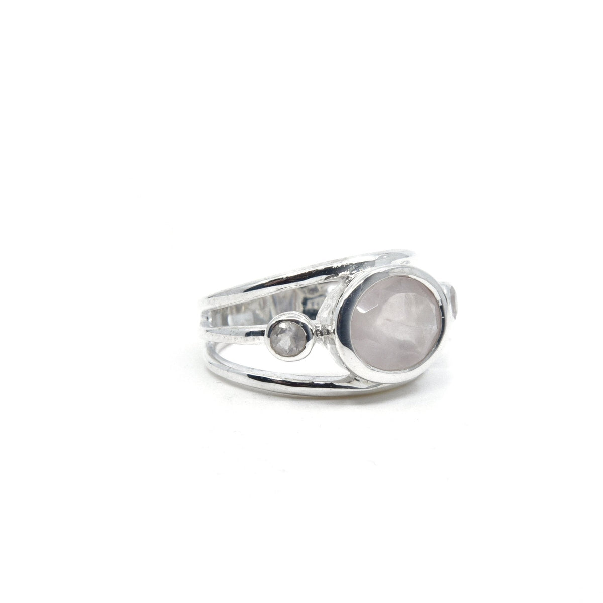 elegant side profile of Quartz (Rose) ring #R547, the gemstone catching light — Eternal Spirit