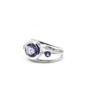 Amethyst ring #R549 angled to reveal its polished setting and silver band — Eternal Spirit