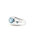 elegant side profile of Topaz (Blue) ring #R554, the gemstone catching light — Eternal Spirit