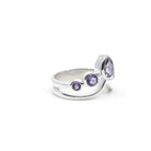 Amethyst ring #R559 angled to reveal its polished setting and silver band — Eternal Spirit