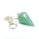 Close-up of Fluorite (Green) large faceted pendulum, emerald green stone detail — Eternal Spirit