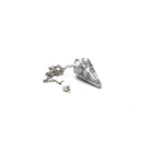 Close-up of Howlite small faceted pendulum, creamy white stone detail — Eternal Spirit