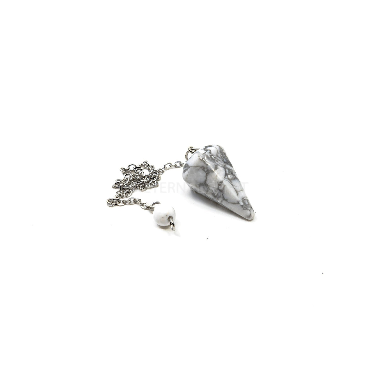 Close-up of Howlite small faceted pendulum, creamy white stone detail — Eternal Spirit