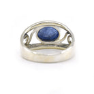elegant side profile of Tanzanite ring #R756, the gemstone catching light — Eternal Spirit