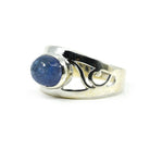Tanzanite ring #R756 angled to reveal its polished setting and silver band — Eternal Spirit