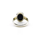 elegant side profile of Sapphire (Blue) ring #R727, the gemstone catching light — Eternal Spirit