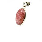 rhodocrosite cabochon oval pendant, side view with silver bail and natural stone edge — Eternal Spirit