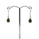 jade (nephrite) cabochon teardrop earrings with silver setting on white background — Eternal Spirit