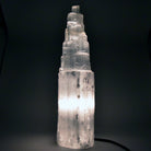 luminous white Selenite crystal lamp (L), glowing from within — Eternal Spirit