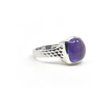 Amethyst ring #R362 angled to reveal its polished setting and silver band — Eternal Spirit