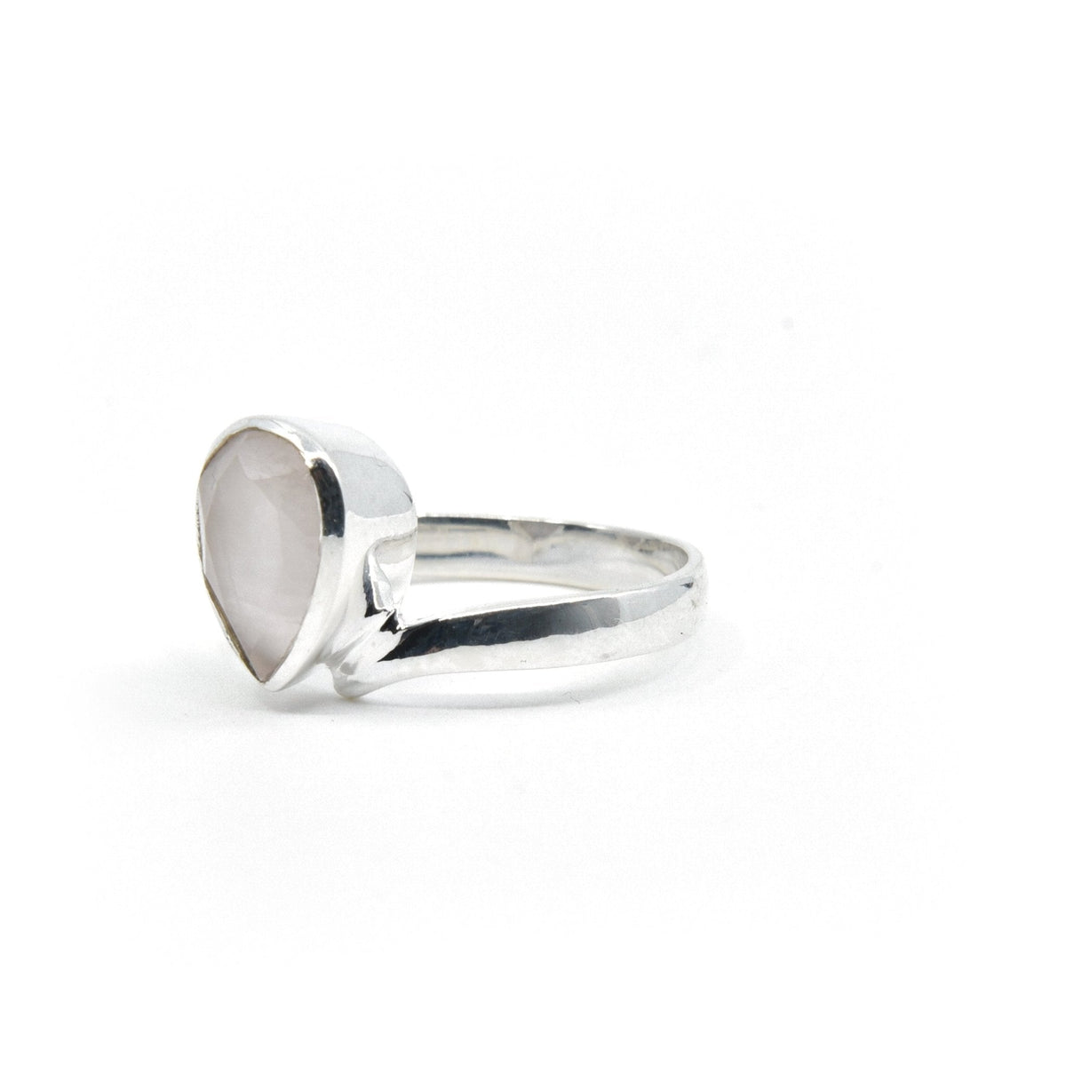 elegant side profile of Quartz (Rose) ring #R371, the gemstone catching light — Eternal Spirit