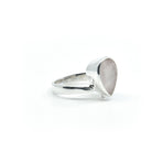 Quartz (Rose) ring #R372 angled to reveal its polished setting and silver band — Eternal Spirit
