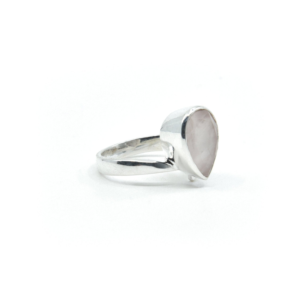 Quartz (Rose) ring #R372 angled to reveal its polished setting and silver band — Eternal Spirit