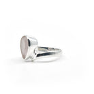 elegant side profile of Quartz (Rose) ring #R372, the gemstone catching light — Eternal Spirit