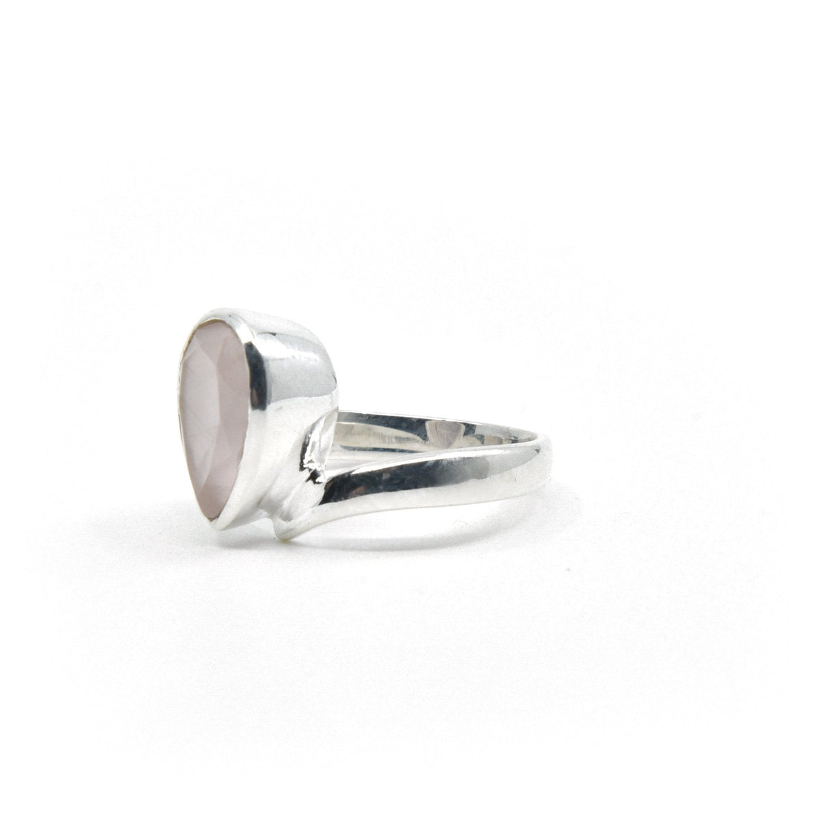 elegant side profile of Quartz (Rose) ring #R372, the gemstone catching light — Eternal Spirit