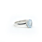 Aquamarine ring #R397 angled to reveal its polished setting and silver band — Eternal Spirit