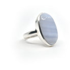 Agate (Blue Lace) ring #R410 angled to reveal its polished setting and silver band — Eternal Spirit