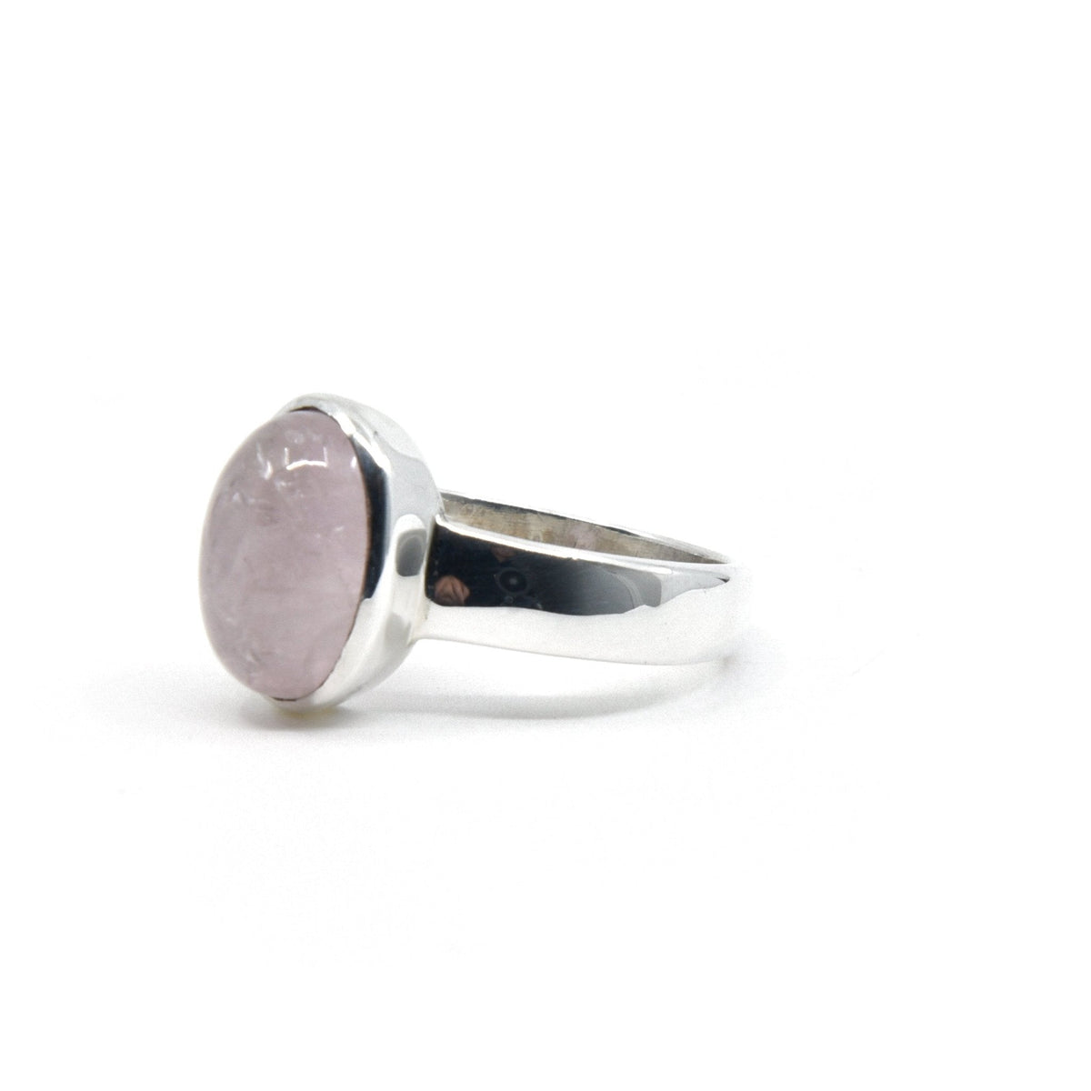 elegant side profile of Morganite ring #R436, the gemstone catching light — Eternal Spirit