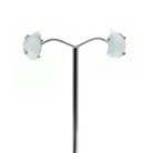 aquamarine natural studs earrings with silver setting on white background — Eternal Spirit