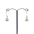 moonstone (rainbow) faceted triangle earrings with silver setting on white background — Eternal Spirit